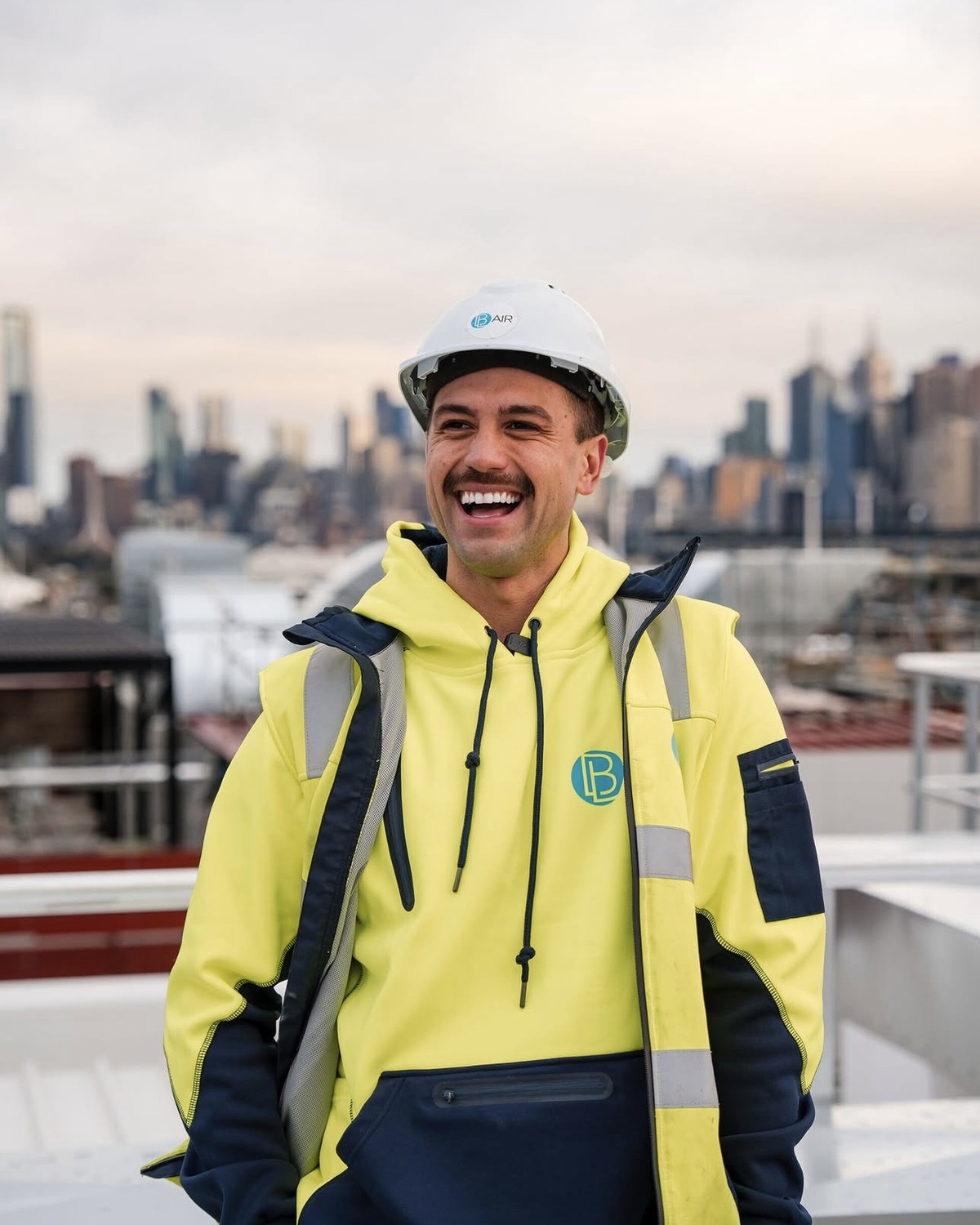 Brandon, founder of BL Air, on a commercial rooftop in Melbourne