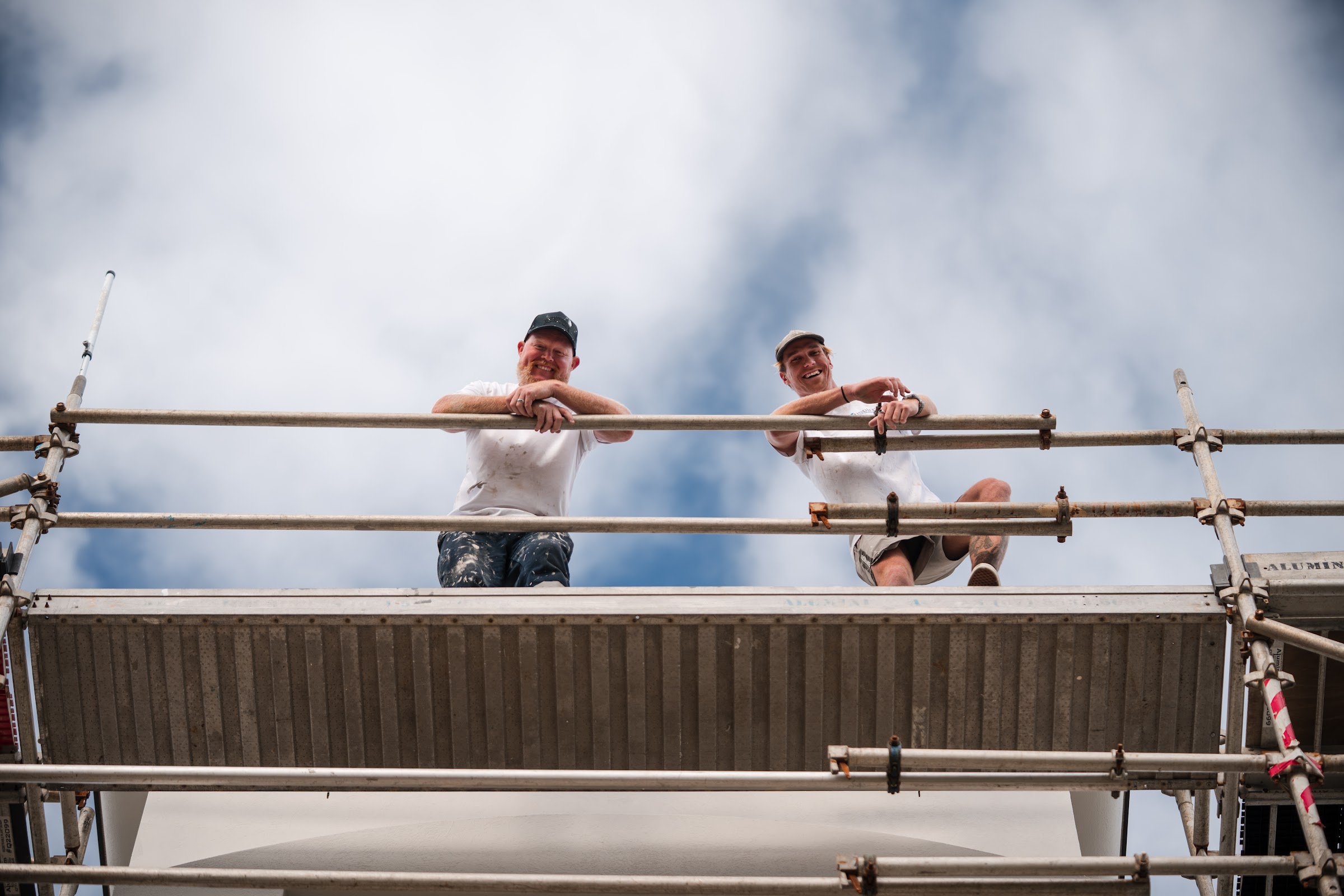 Painters on scaffolding, filmed on site by Hipe Media